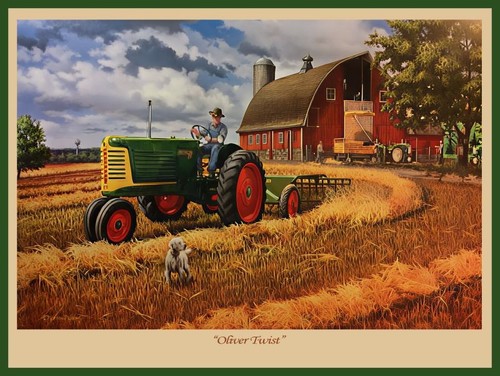 Oliver row crop tractor in - row,