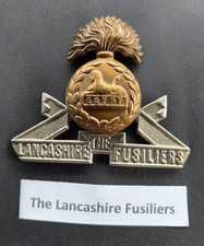 The Lancashire Fusiliers. British Military Bi Metal Cap Badge, Slider