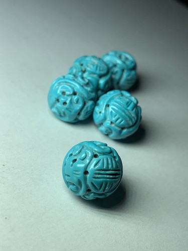 One vintage carved - one,