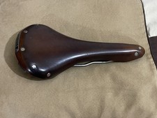 Used Brooks Swallow saddle. Titanium rails.Antique Brown colour.Good Condition 