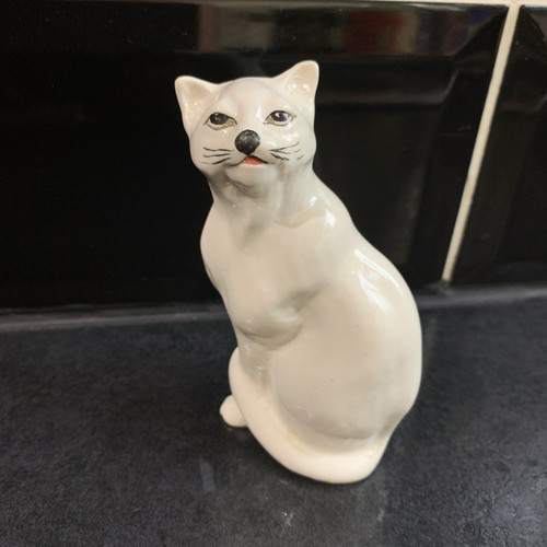 White ceramic hand - hand, cat