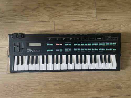 Yamaha dx100 synthesizer - synthesizer, in