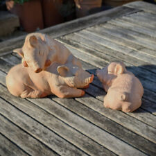 Shhh! Sleeping pigs. Vintage ceramic bisque, one pair and one single.