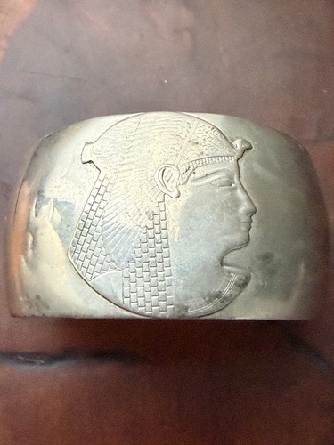 Silver toned egyptian type - toned,