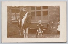 RPPC Boy in School Uniform on Piebald Pony & Child on Toy Horse Tricycle c.1910
