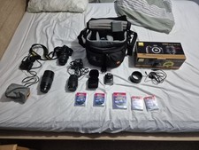 Nikon D60 Digital SLR Camera.  Boxed with additional  lenses, a flash and bag.