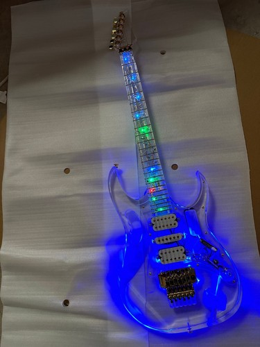 Electric guitar with a - an,