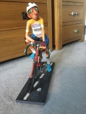 Caricature figurine of cyclist on bike Forchino collectible statue