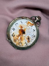 Antique enamel dial clock -