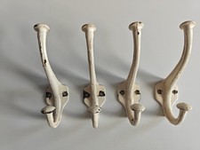 4 off Vintage Cast Iron Coat