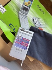 Sony Clie PEG-NR70V Handheld PDA With Compact Keyboard PEG-KB100.