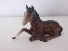 VINTAGE BESWICK BROWN LYING