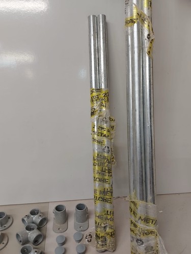 Six galvanised tubes with - six,