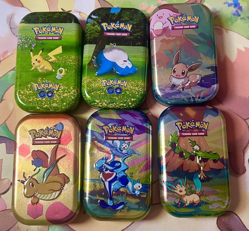 50x pokémon mystery mini - 50x, tin