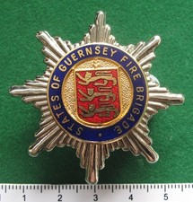 Guernsey ( States of ) Fire Brigade cap badge