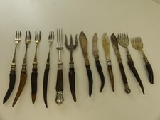 (ref288BC) 12 antique bovine horn handled cutlery items pickle forks butter kniv