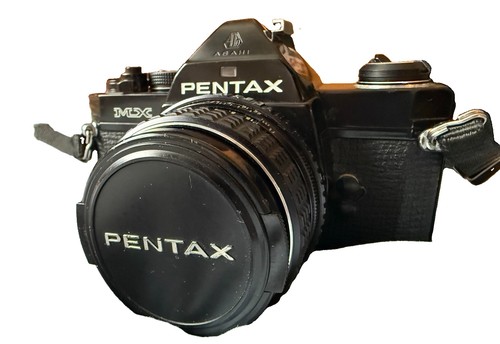 Pentax black camera with - mx,