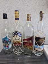 4 Assorted Empty 70cl Rum Bottles