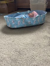 Handmade baby carry cot with