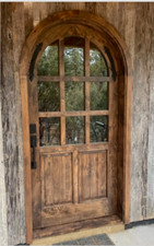 Rustic reclaimed lumber arch