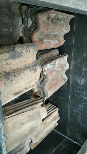 Reclaimed clay roof pan tiles.