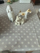 Vintage White Standard Poodle Dog Figurine, and two separate Terrier Figurines