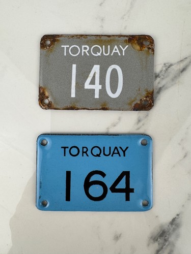 Pair vintage enamel torquay - of,