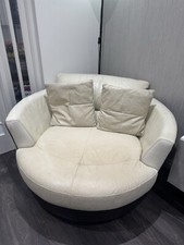 DFS Swivel Cream and Brown