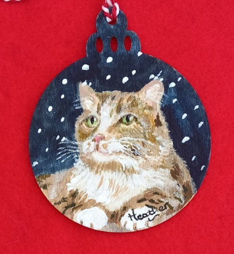 Christmas tree bauble hand
