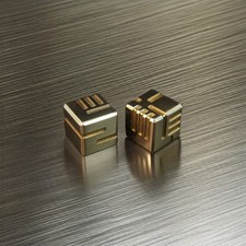 Set of 2 Brass AKO Dice -