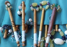 Vintage Collection Of Lace Making Bobbins In Hand Crafted Material Wallet.