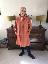 Woman Stutterheim Burnt Orange Rain Coat