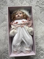 Brand New Porcelain Baby Doll