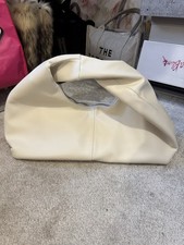 Cream slouch large faux