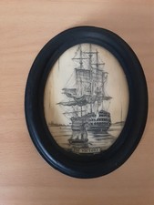 "THE VICTORY".  HMS VICTORY SCRIMSHAW REPRODUCTION IN OVAL FRAME. NICE QUALITY!