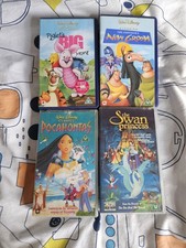 4 VHS Videos Kids Disney's Piglet Empirers new Grove Pocohontas Swan Princess 