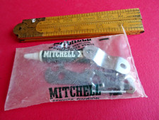 AN UNOPENED MITCHELL SEA MULTIPLIER BAG WITH ROD FITTING PARTS, SPANNER ETC