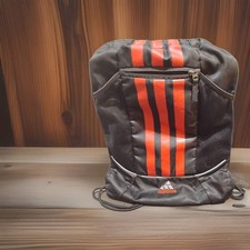 Adidas Black with red Stripes