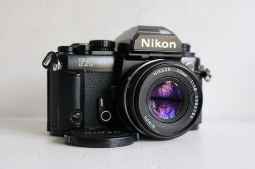 Nikon black 35mm film - black,
