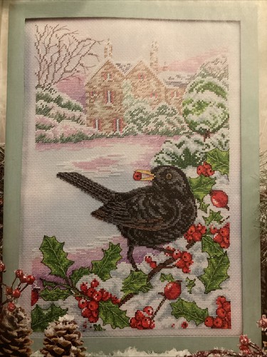 Winter garden blackbird cross - garden,