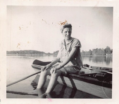 Woman sitting fishing boat - woman,