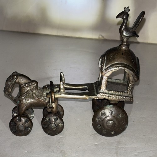 Horse and cart wheels in - and, on