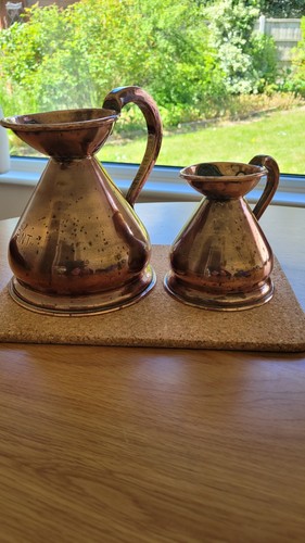 Pair antique copper ale - of,