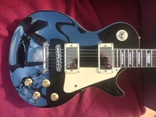 Gear4Music single cut LP Style electric guitar. Not quite Vintage, China made.