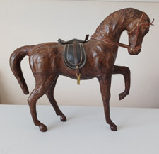 Vintage leather standing horse with saddle