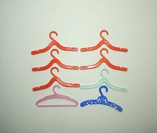Vintage doll clothes hangers