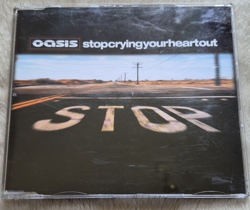 Oasis stop crying - -,