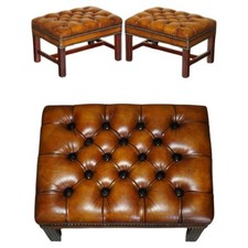 PAIR OF FULLY RESTORED VINTAGE HAND DYED BROWN LEATHER CHESTERFIELD FOOTSTOOLS