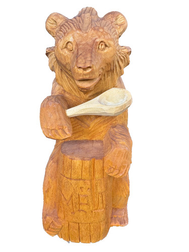 The bear figurine hand - figurine.,