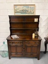 A vintage ERCOL Old Colonial dresser two drawers cupboards plate rack kitchen st